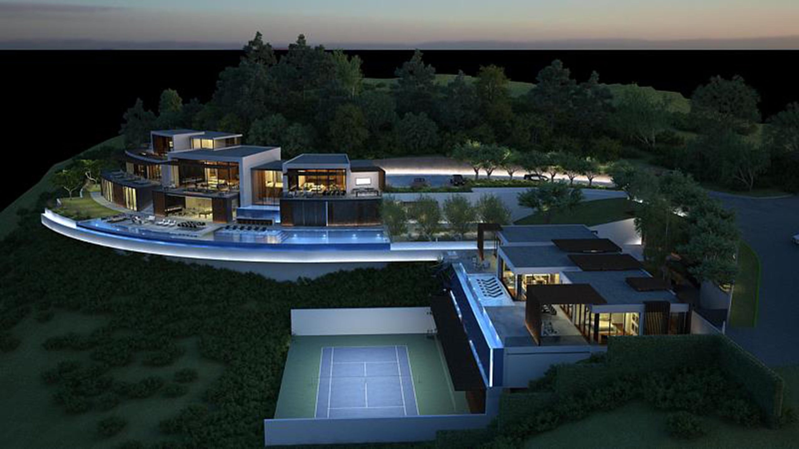 Bel Aire – Tione — Overhead night view of the full compound with illuminated pool, tennis court, and motor court