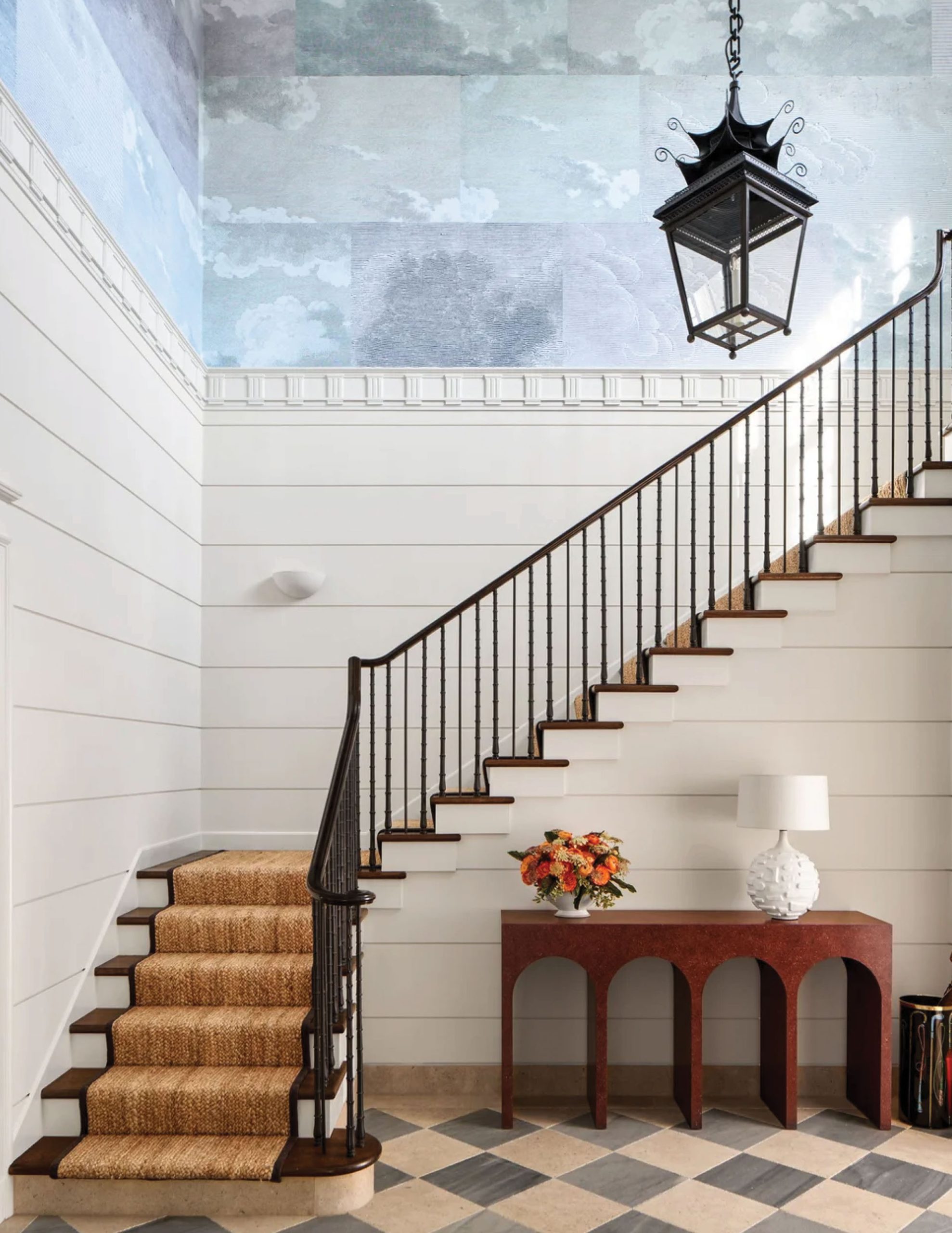 Park Cities – Crescent — Entry stair with hand-painted cloud mural, wrought iron rail, and checkerboard floor