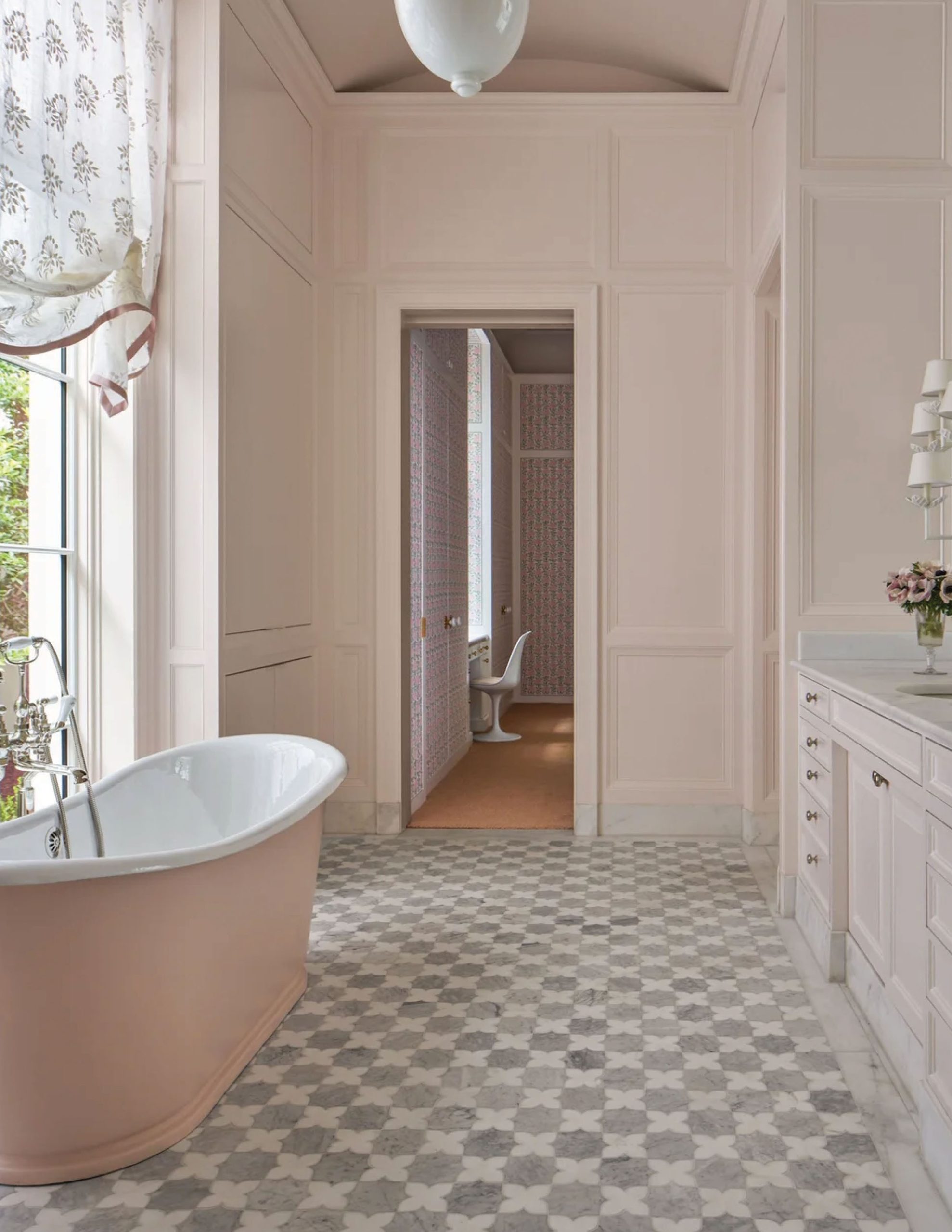 Park Cities – Crescent — Blush marble primary bathroom with pink soaking tub and checkerboard tile floor