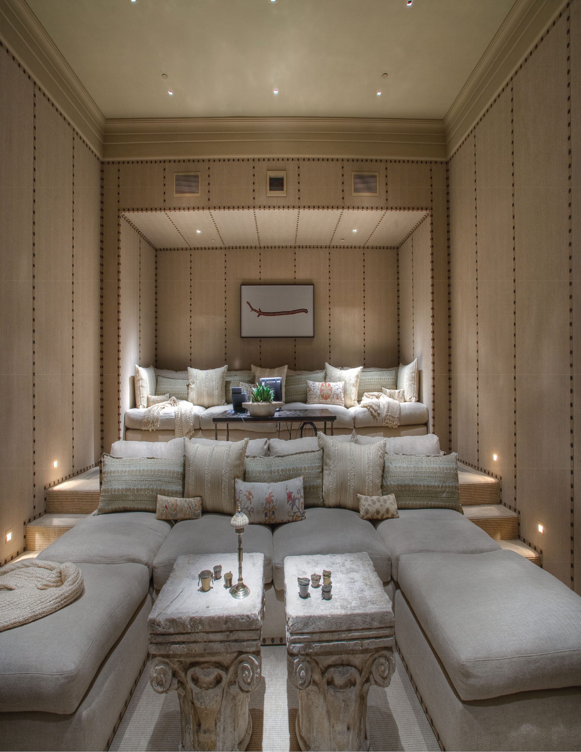 Las Vegas – Lot 8 — Primary bedroom with ornate carved-stone fireplace and arched ceiling