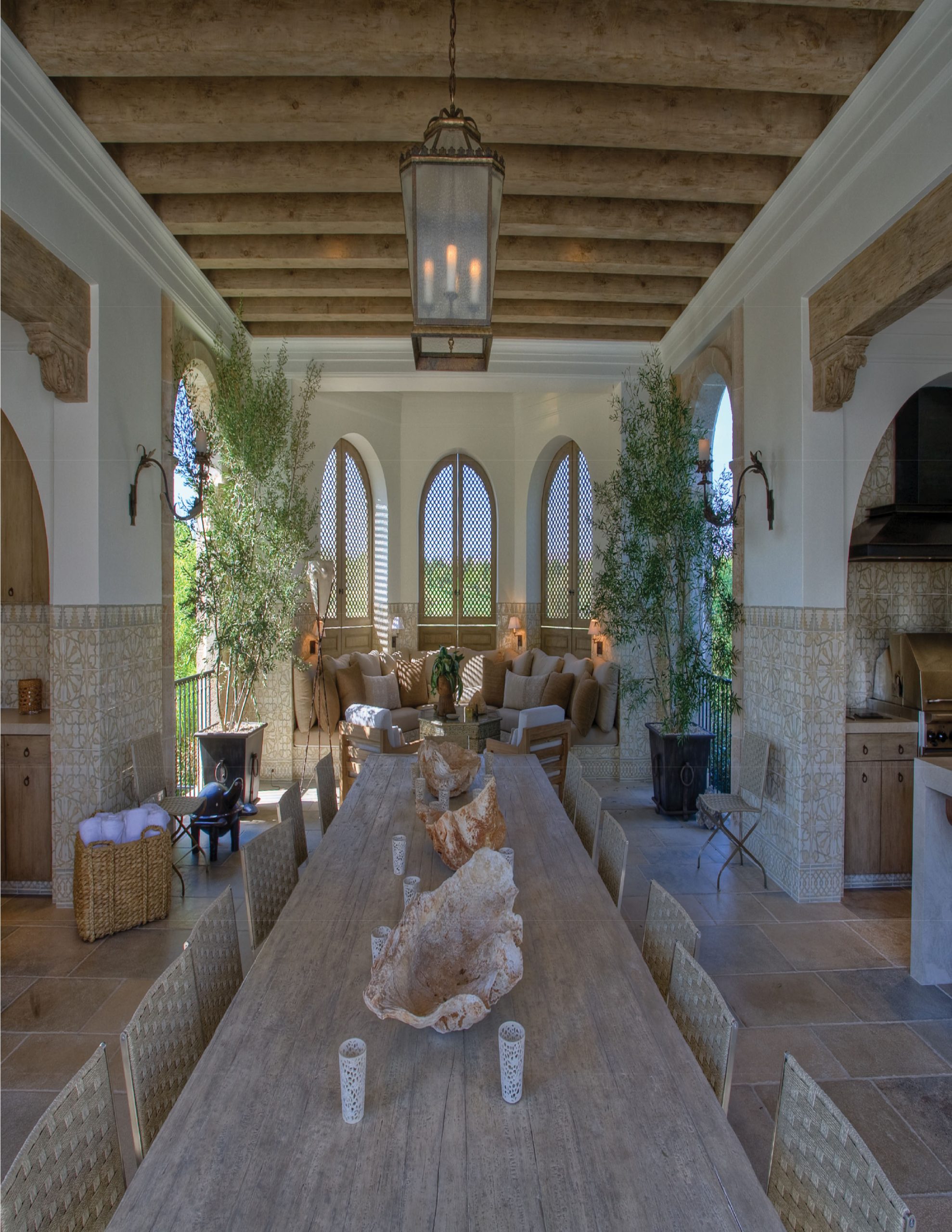 Las Vegas – Lot 8 — Spa bathroom with round carved-stone soaking tub and arched window